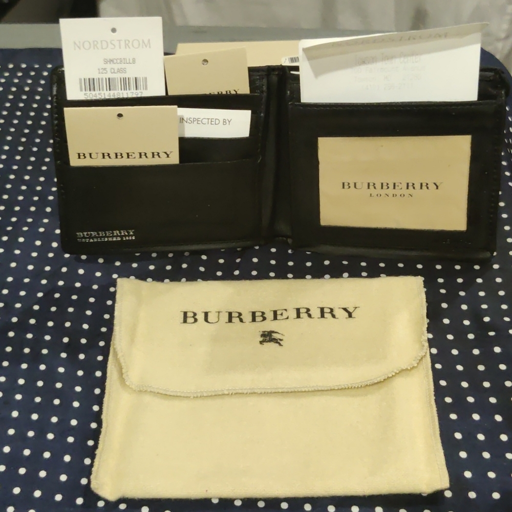Used Burberry Wallet With all tags and box.